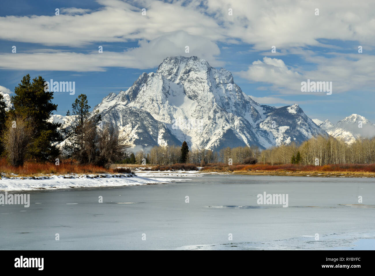Snow Covered Mount Moran with Frozen Snake River at OxBow Bend,in the Foreground Stock Photo