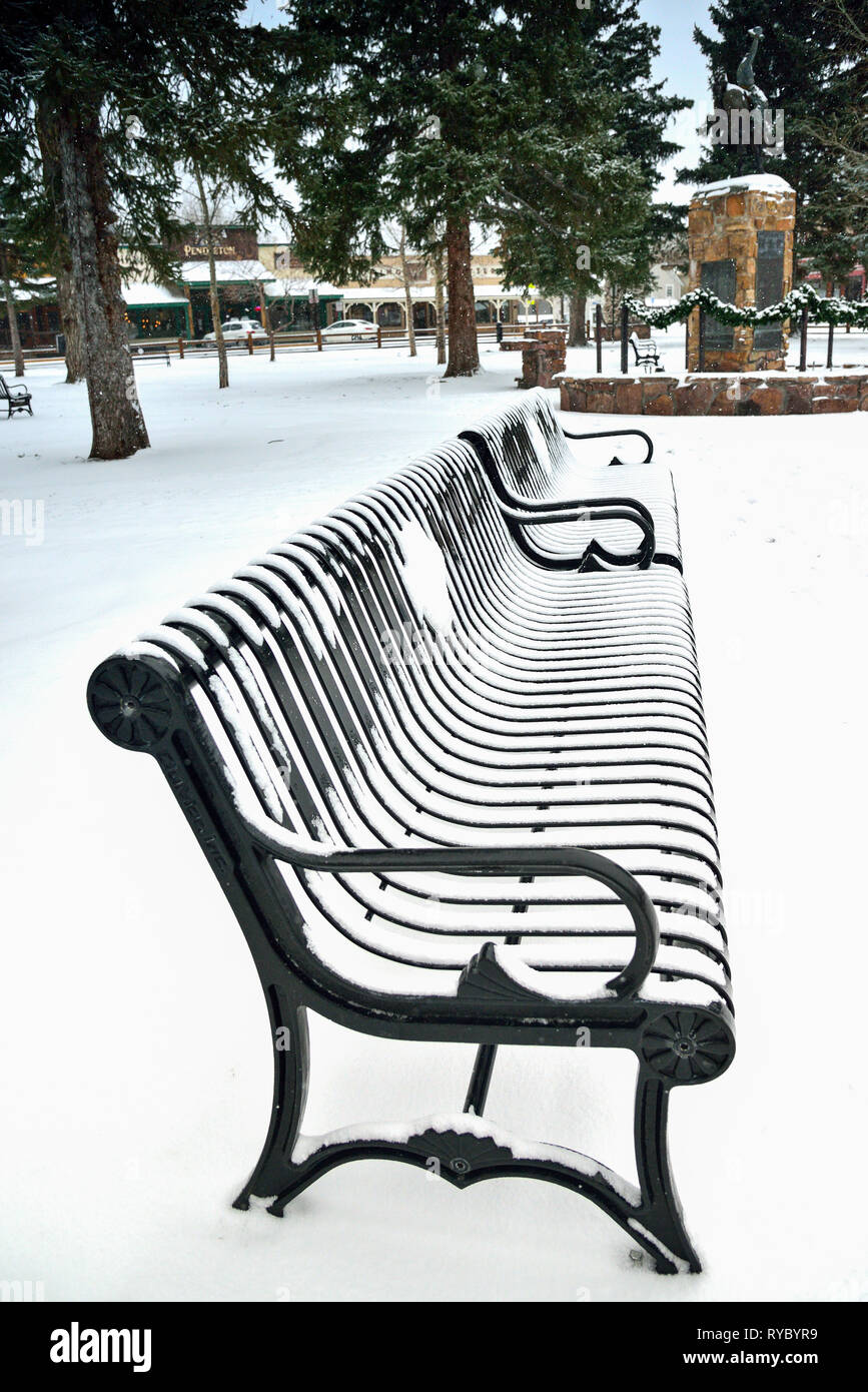 Snow covered Bench in Jackson Town Square Stock Photo