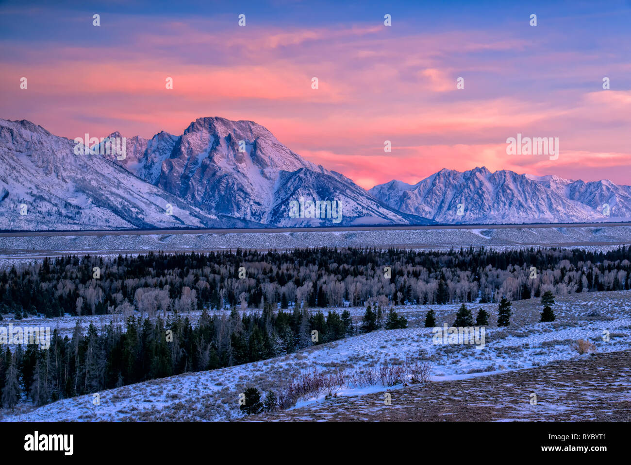 Morning Alpenglow in the Tetons Stock Photo