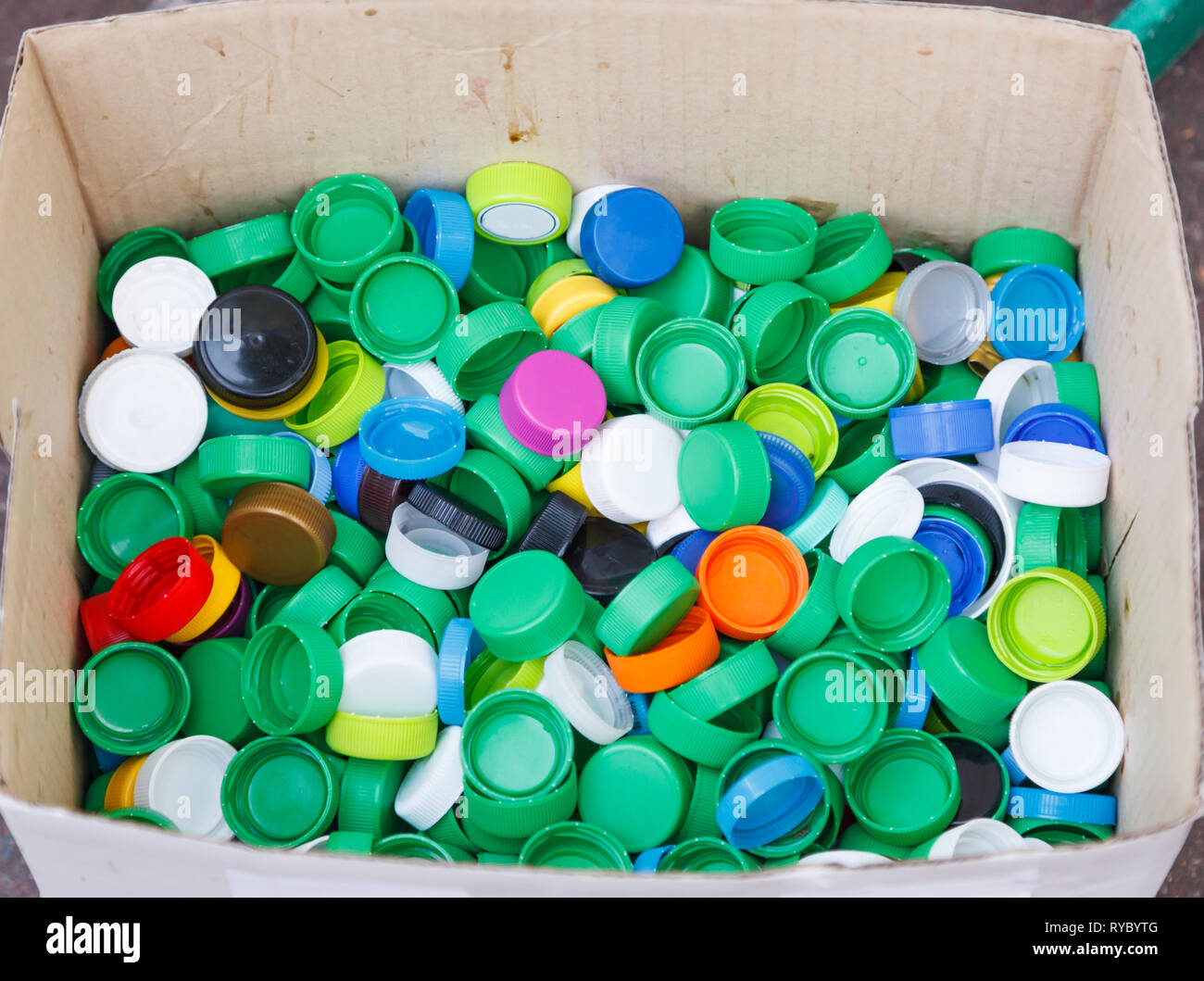 Bottle Cap, made of Polypropylene and Polyethylene Plastic Resin, do not biodegrade. If not recycled, these caps pose danger to marine life because of Stock Photo