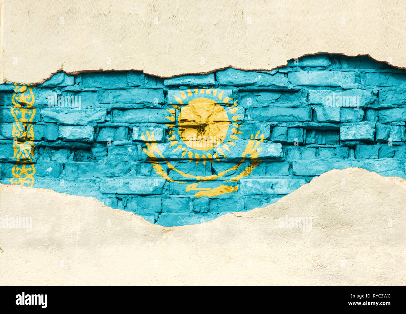 National flag of Kazakhstan on a brick background. Brick wall with ...
