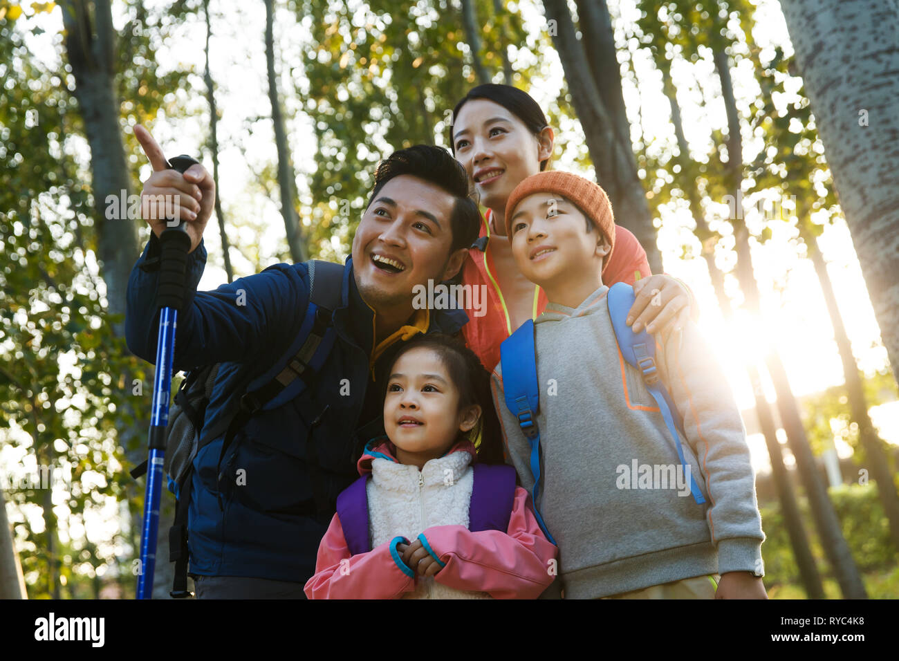 Happy family hiking hi-res stock photography and images - Alamy