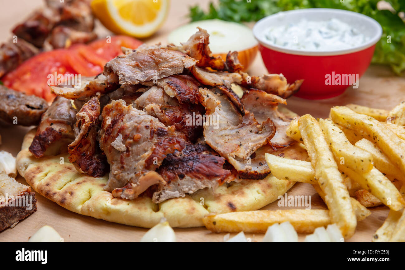 Shawarma, gyros pita. Traditional turkish, greek meat food on pita