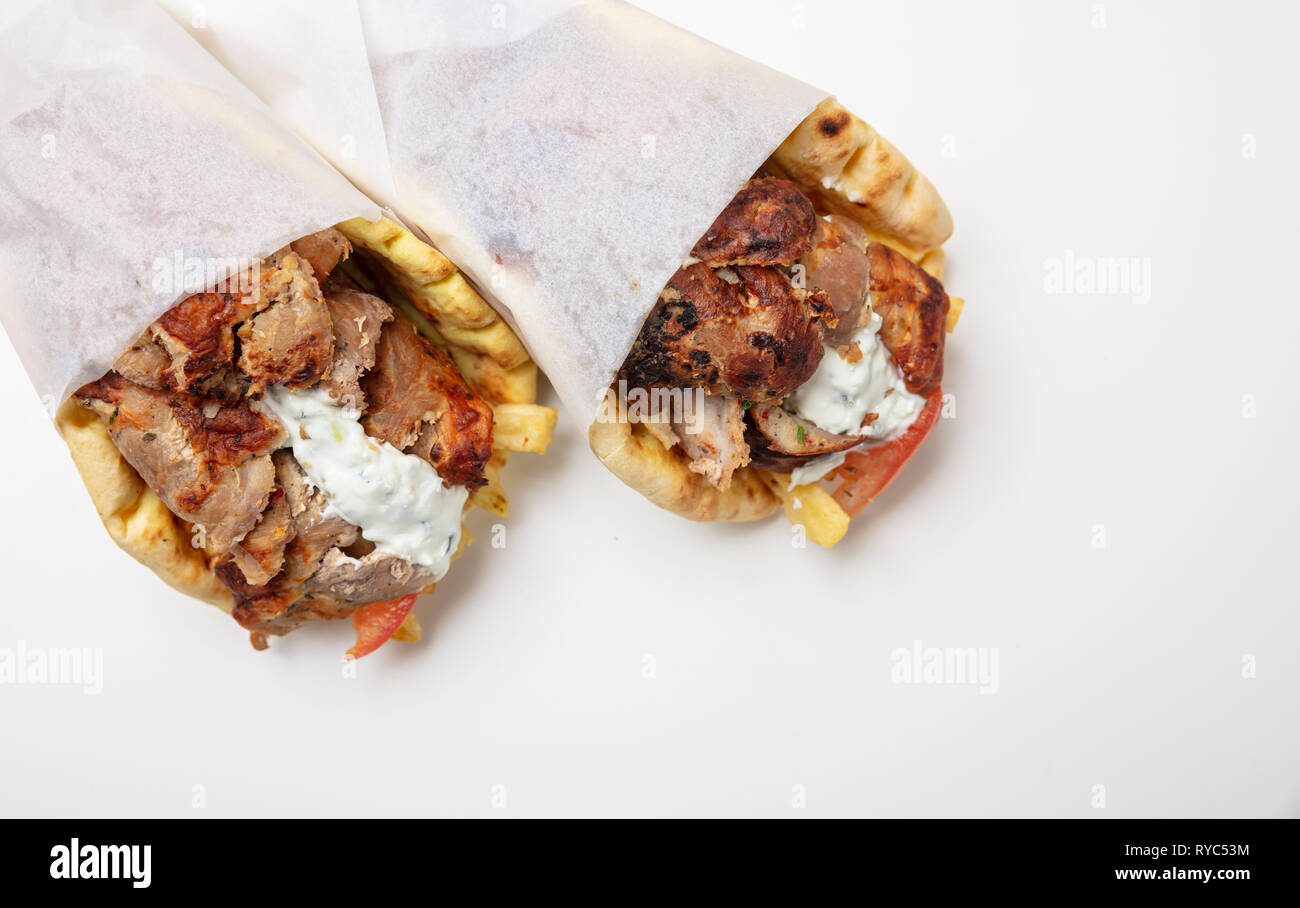 Gyro pita, shawarma, take away, street food. Two pita bread wraps with