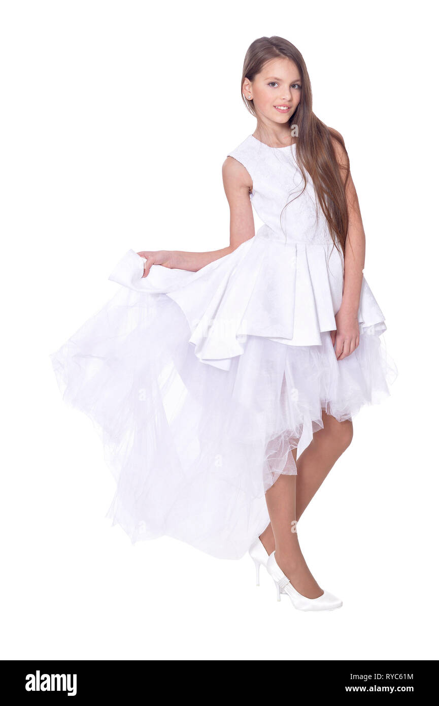 Portrait of beautiful girl in white dress posing Stock Photo - Alamy
