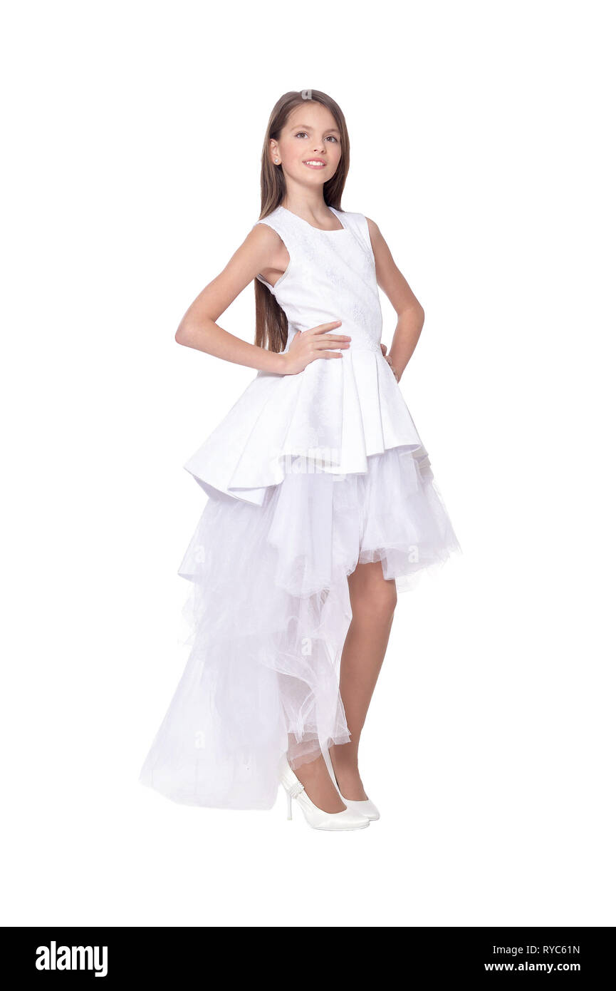 Portrait of beautiful girl in white dress posing Stock Photo - Alamy