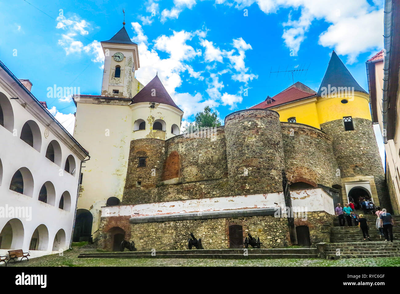 Mukachevo Palanok Castle Fortification Walls with Clock Tower at Background Stock Photo