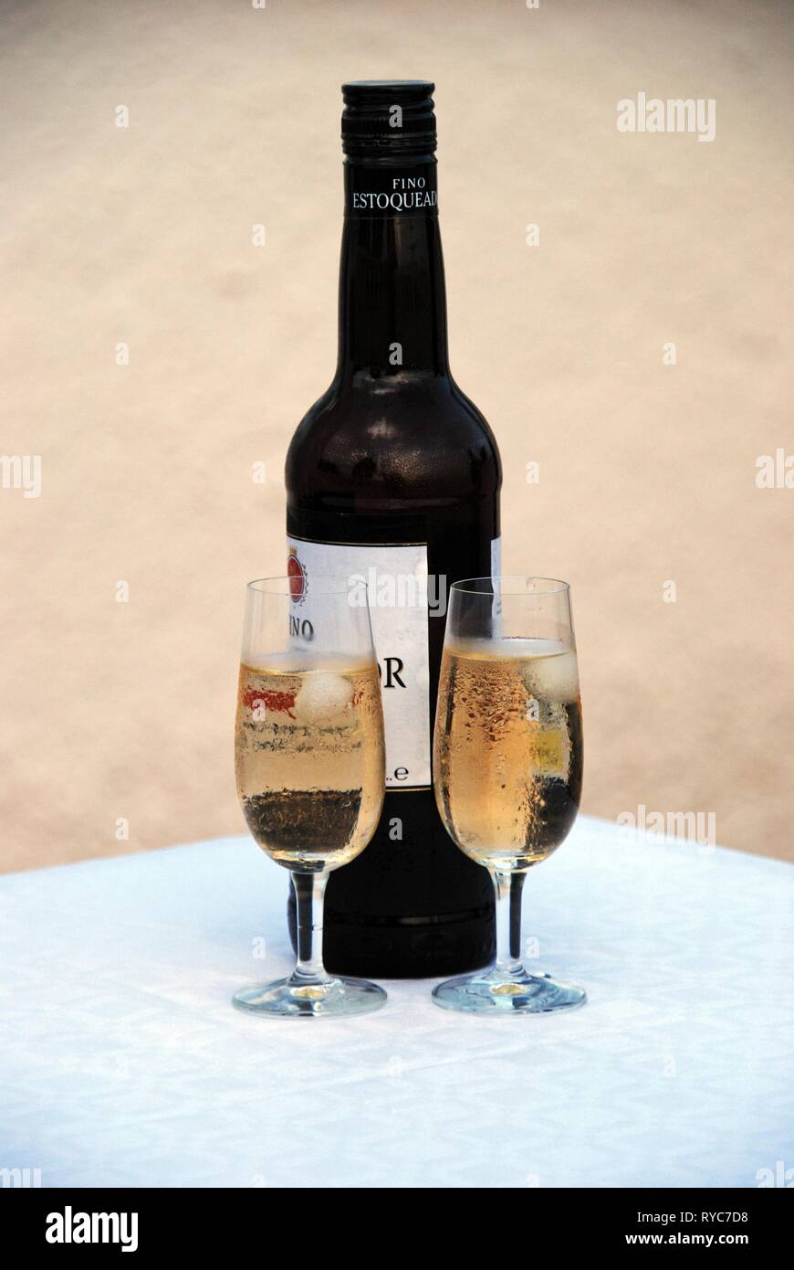 Two glasses of fino sherry with the bottle to the rear, Andalusia