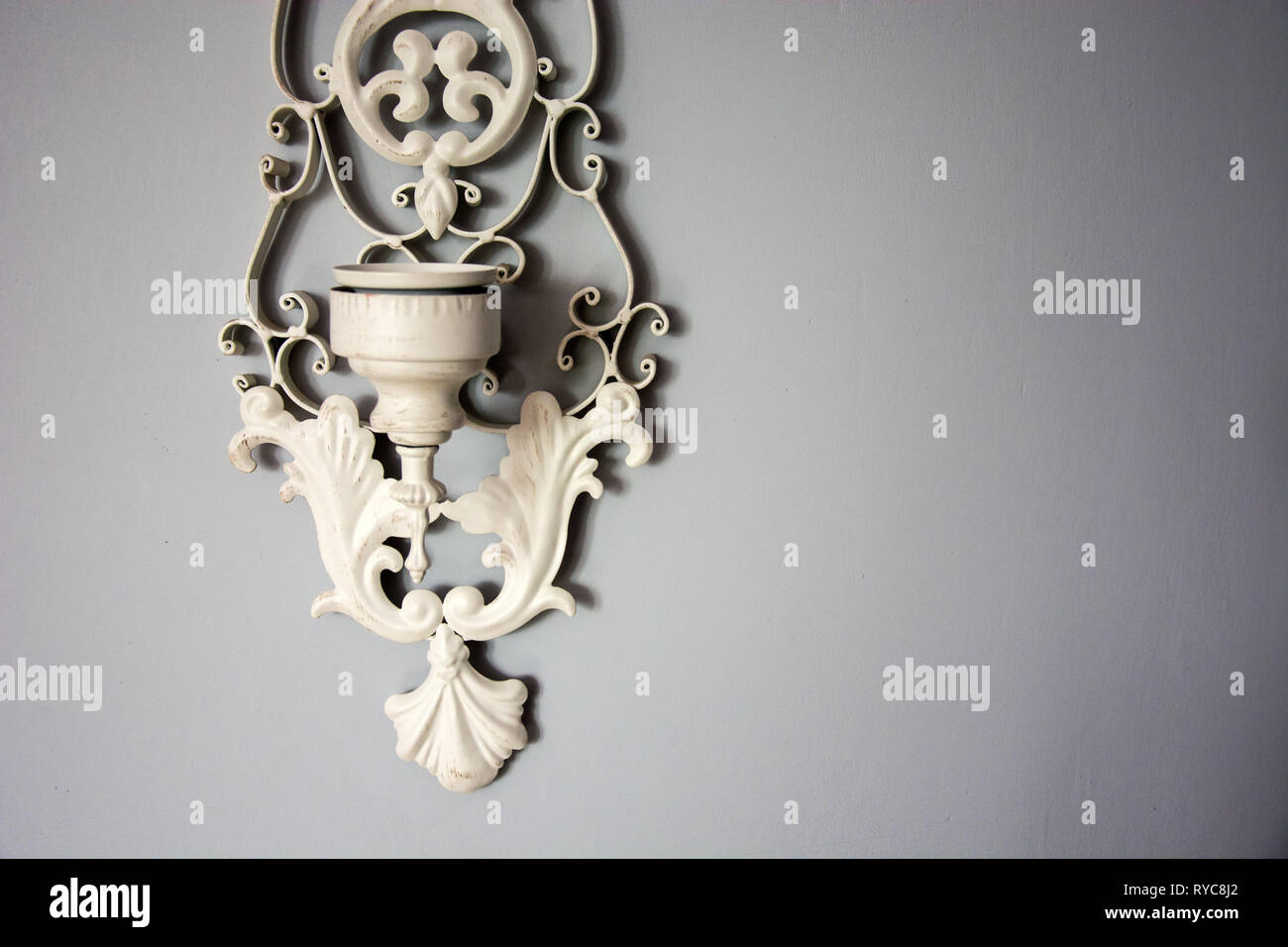 Old decorative wall candlestick - close-up Stock Photo