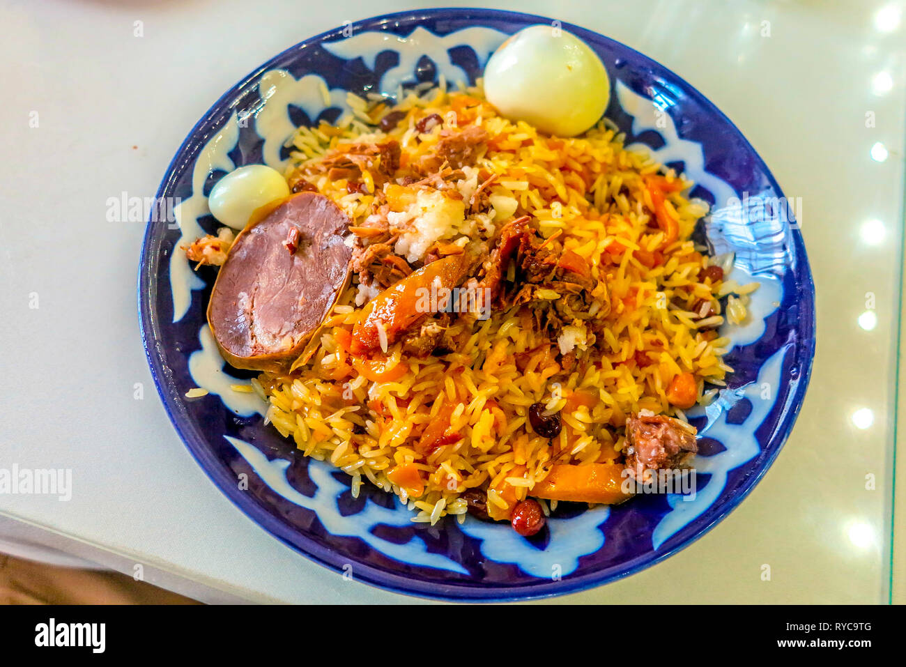 Uzbek Traditional Lamb Pilaf Meat Chunks Carrots Eggs and Raisins with