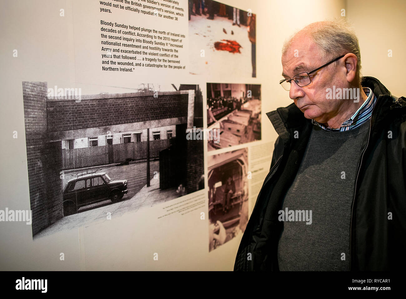 Mickey McKinney looks at a photo on the wall of the Museum of Free Derry which show his killed brother William in Derry on Bloody Sunday. The Public Prosecution Service is expected to announce on Thursday whether it will pursue prosecutions against soldiers over the deaths of 13 people in Londonderry on January 30 1972. Stock Photo