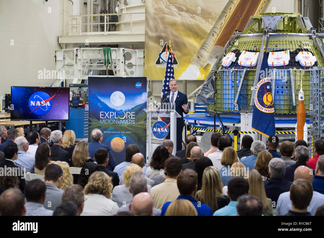 NASA Administrator Jim Bridenstine addresses employees on progress toward sending astronauts to the Moon and on to Mars while standing in front of the Orion spacecraft during a televised event at the Kennedy Space Center March 11, 2019 in Cape Canaveral, Florida. Stock Photo