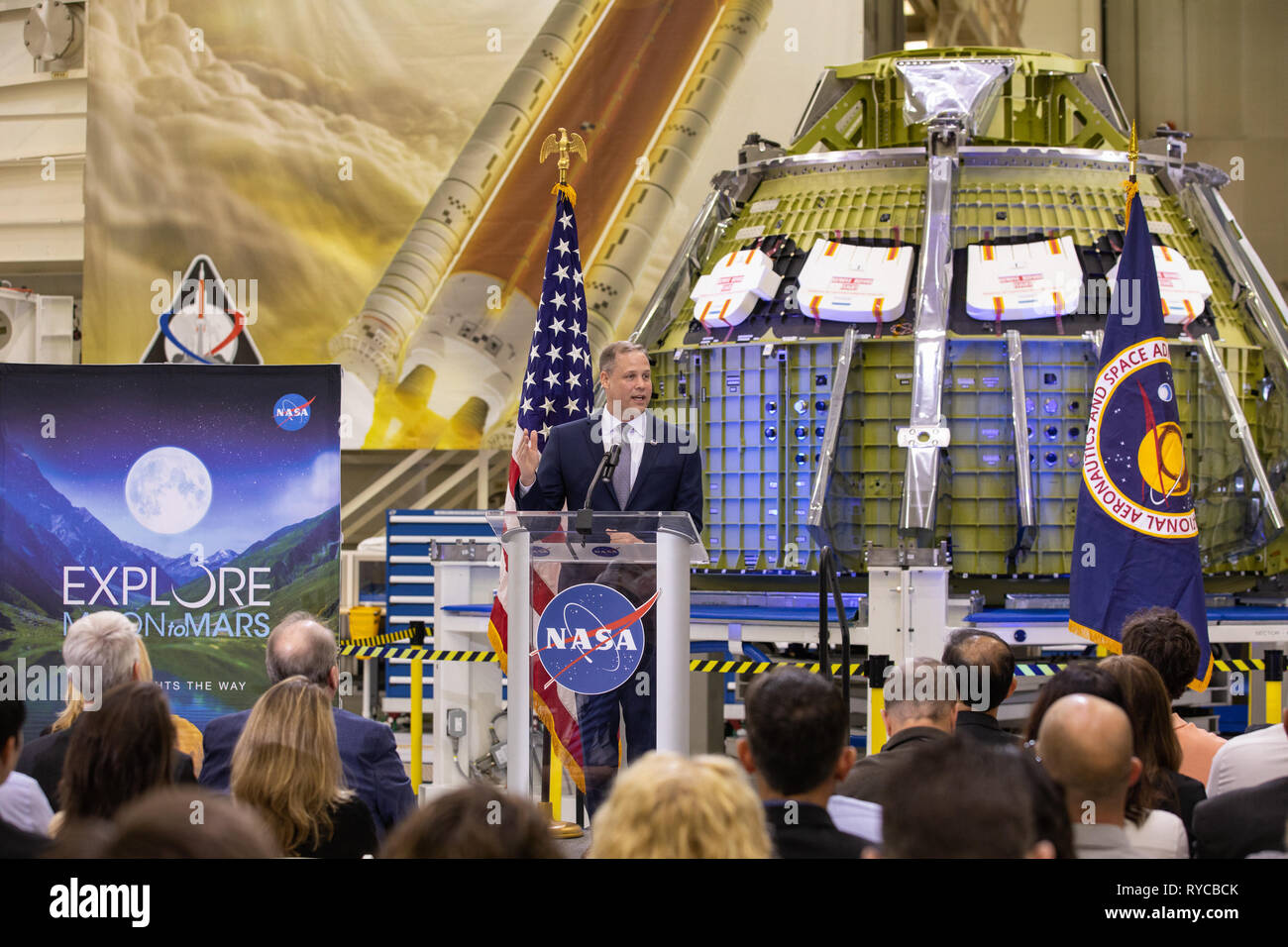 NASA Administrator Jim Bridenstine, standing in front of the new Orion crew capsule, addresses employees on progress toward sending astronauts to the Moon and on to Mars during a televised event at the Kennedy Space Center March 11, 2019 in Cape Canaveral, Florida. Stock Photo