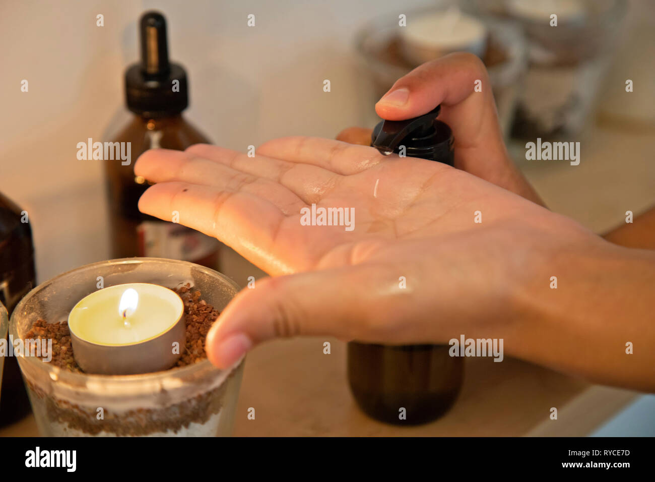 Close up on the hands of a masseuse during a massage treatment in a Spa in Ierapetra town, Crete, Greece. Stock Photo