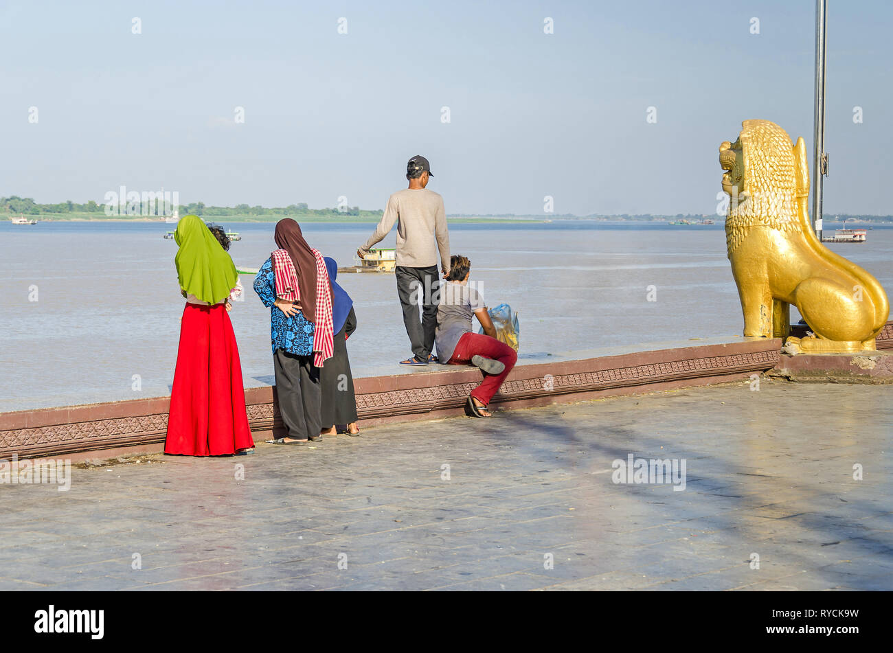 Phnom Penh, Cambodia - April 9, 2018: Preah Sisowath Quay, a riverside promenade along the banks of the Mekong and Tonle Sap rivers with a leogryph Stock Photo