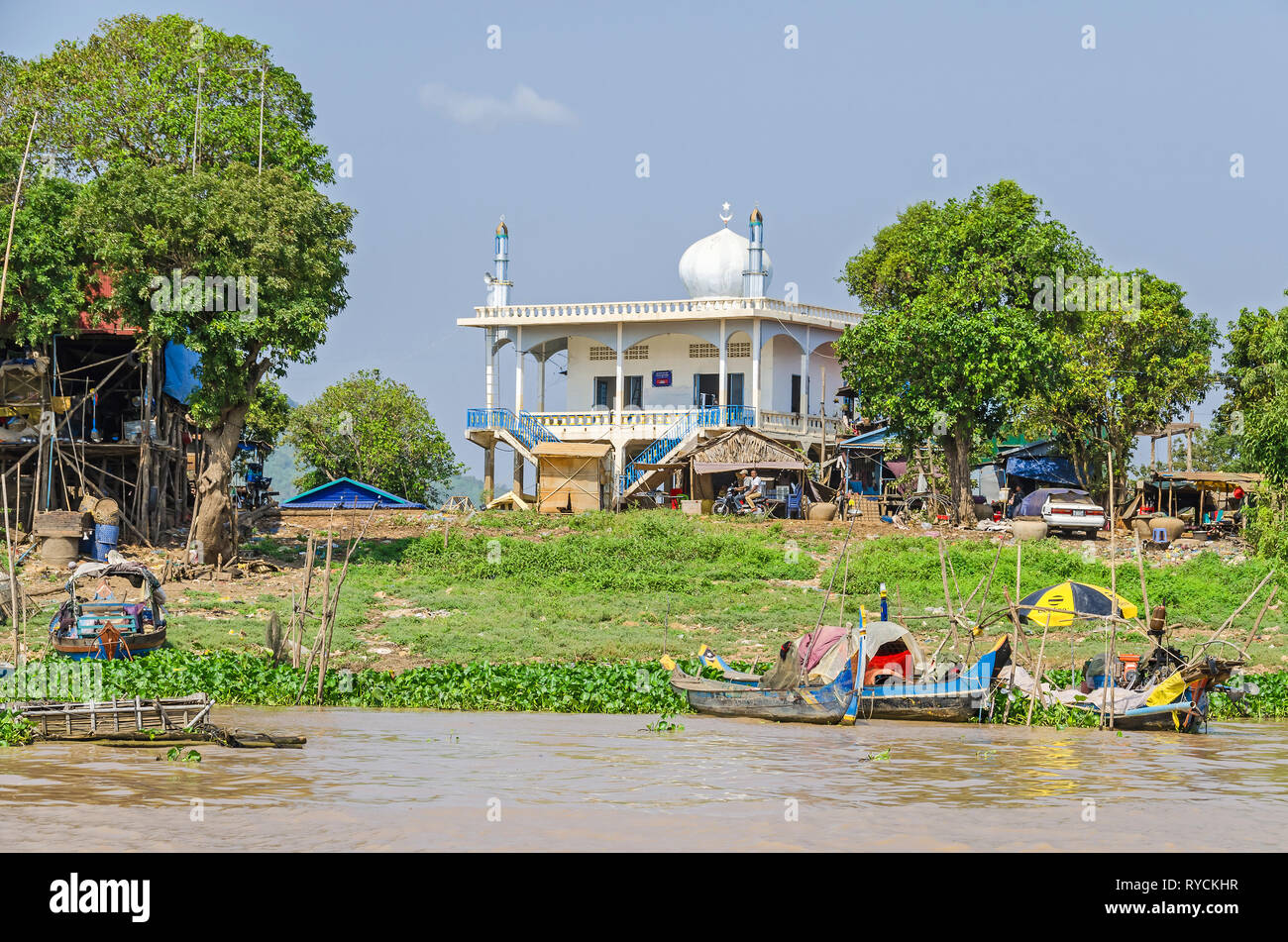 Kampong Chhnang, Cambodia - April 11, 2018: Mosque in one of the small villages near the Kampong Chhnang City on a banks of the Tonle Sap Lake covered Stock Photo