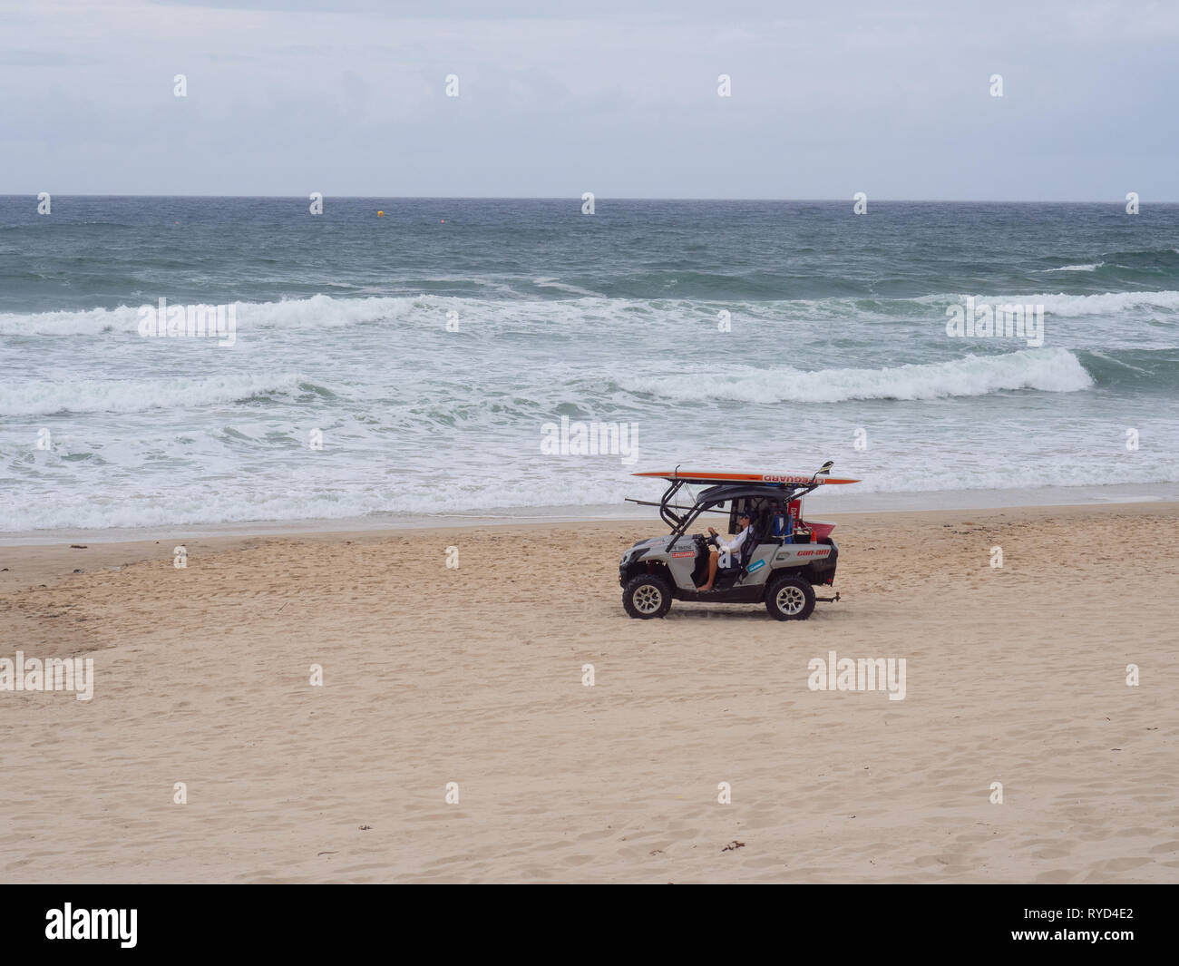 Lifeguard In A Beach Buggy On The Gold Coast Stock Photo