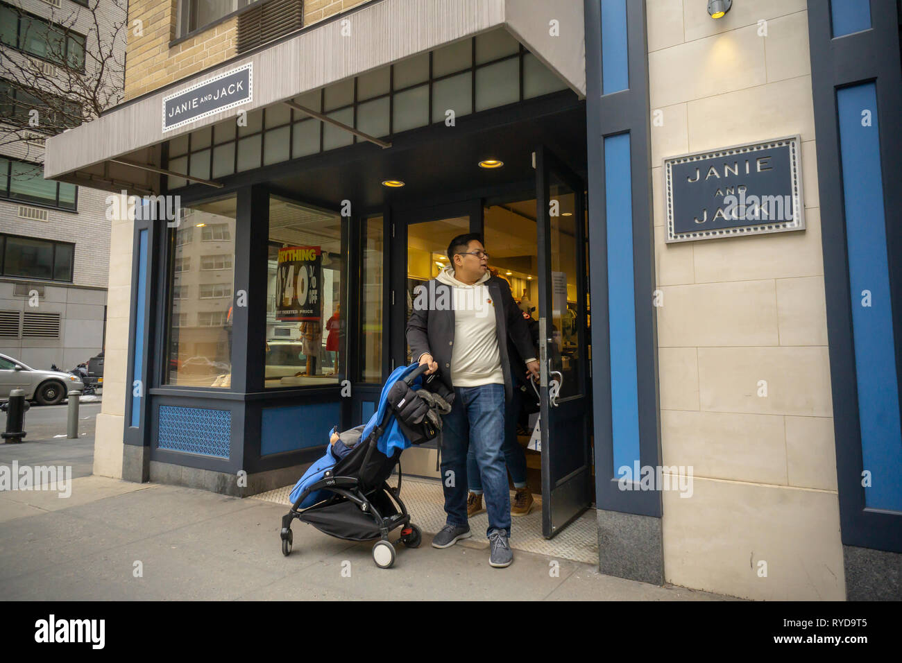 Customers at the Janie and Jack store in the Upper East Side neighborhood of New York on Sunday, March 3, 2019. Gap Inc. is buying the Janie and Jack children's fashion business, including store leases and e-commerce for $25 million form the bankrupt Gymboree. (© Richard B. Levine) Stock Photo