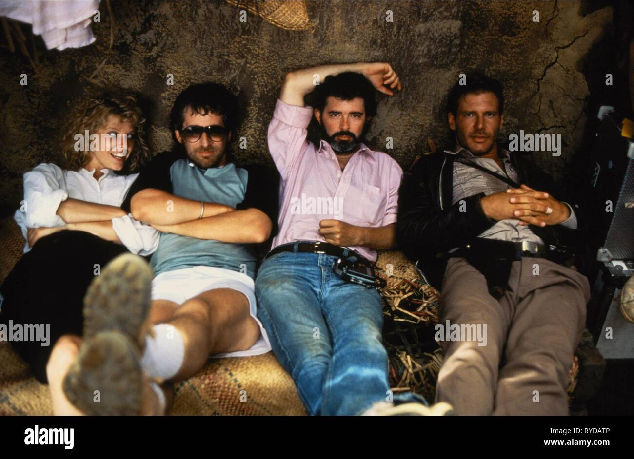 KATE CAPSHAW, STEVEN SPIELBERG, GEORGE LUCAS, HARRISON FORD, INDIANA JONES AND THE TEMPLE OF DOOM, 1984 Stock Photo