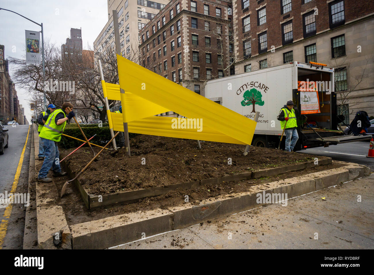 Workers install one of five 'Tension Sculptures' by the artist Joseph La Piana on a Park Avenue median at 67th St in New York on Sunday, March 3, 2019. Made of synthetic rubber and stainless steel the artworks will be on display on five corners of Park Avenue from 53rd St to 70 St until the end of July.  the The Fund for Park Avenue and the NYC Parks and Recreation Dept. have been presenting public art on the medians since 1969.  (Â© Richard B. Levine) Stock Photo