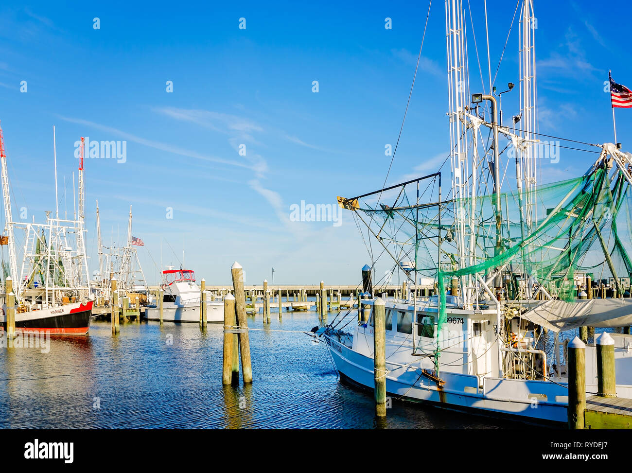 Shrimp boats are docked in Pass Christian Harbor, Feb. 24, 2019, in Pass Christian, Mississippi. Stock Photo