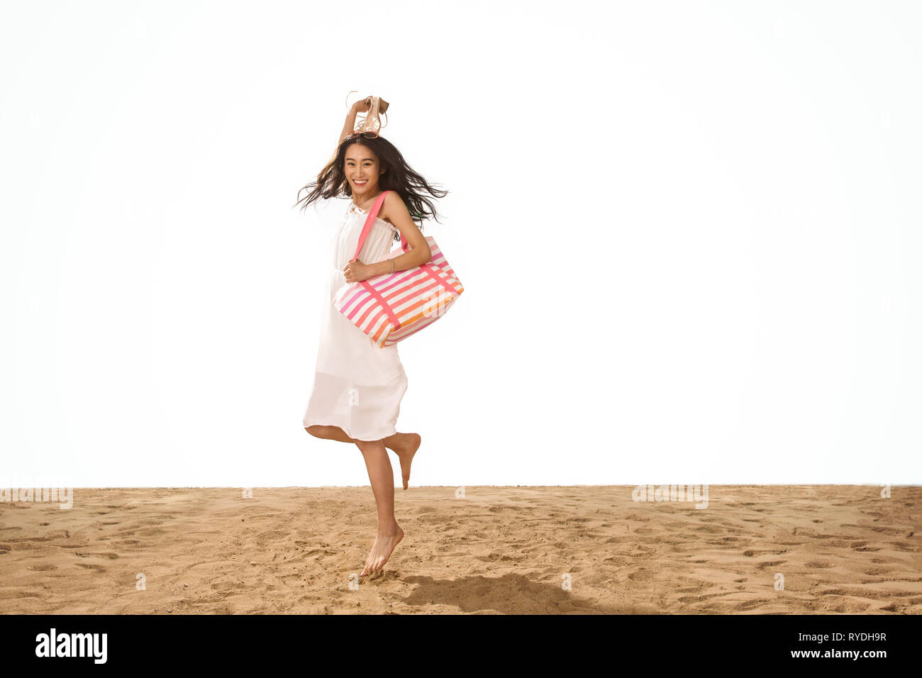 Woman walking arms raised hi-res stock photography and images - Alamy