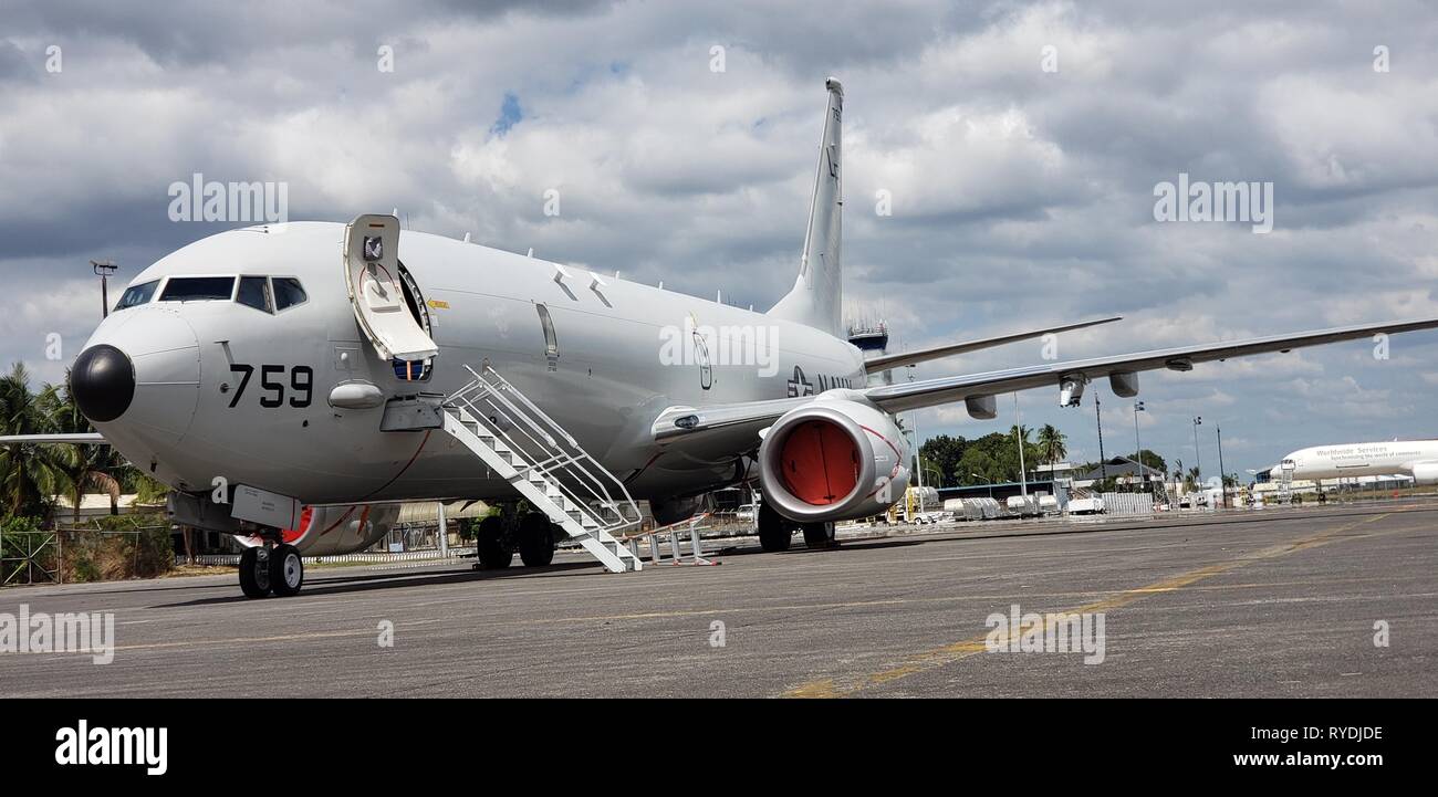 190210-N-PX671-1045    CLARK AIR BASE, Philippines (Feb. 10, 2019) — A P-8A Poseidon aircraft assigned to the 'War Eagles' of Patrol Squadron (VP) 16 is parked on the flight line at Clark Air Base. VP-16 is deployed to the U.S. 7th Fleet (C7F) area of operations conducting maritime patrol and reconnaissance operations in support of Commander, Task Force 72, C7F, and U.S. Pacific Command objectives throughout the Indo-Asia Pacific region. (U.S. Navy photo by Lt. Cmdr. Alan Johnson/Released) Stock Photo