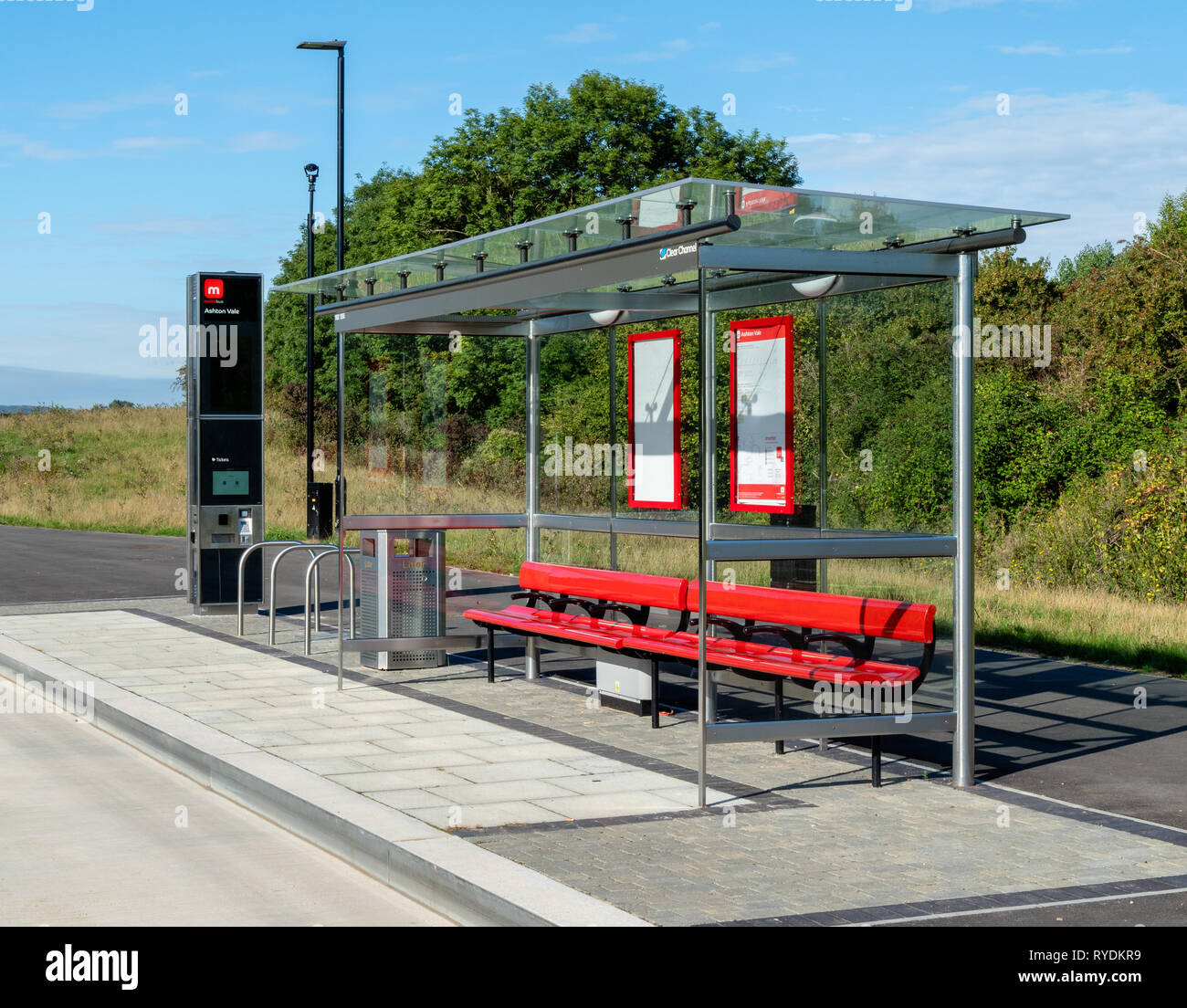 Bristol Metrobus rapid transit system bus stop and ticket pay station on the guided section of the M2 route to the city centre - Bristol UK Stock Photo