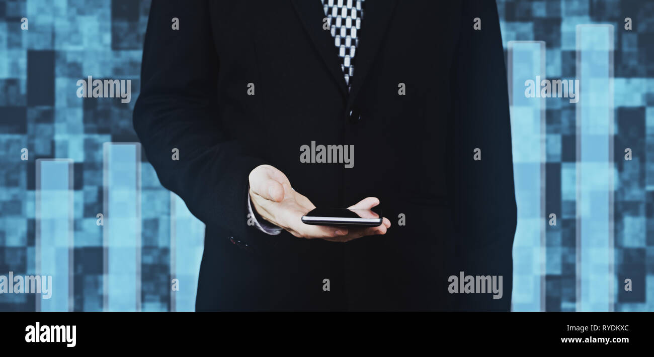 Businessman in Black Suit and Tie Holding Smartphone in Hand Against ...