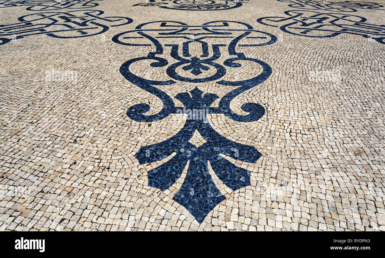 Typical Portuguese cobblestone pavement creating balck and white
