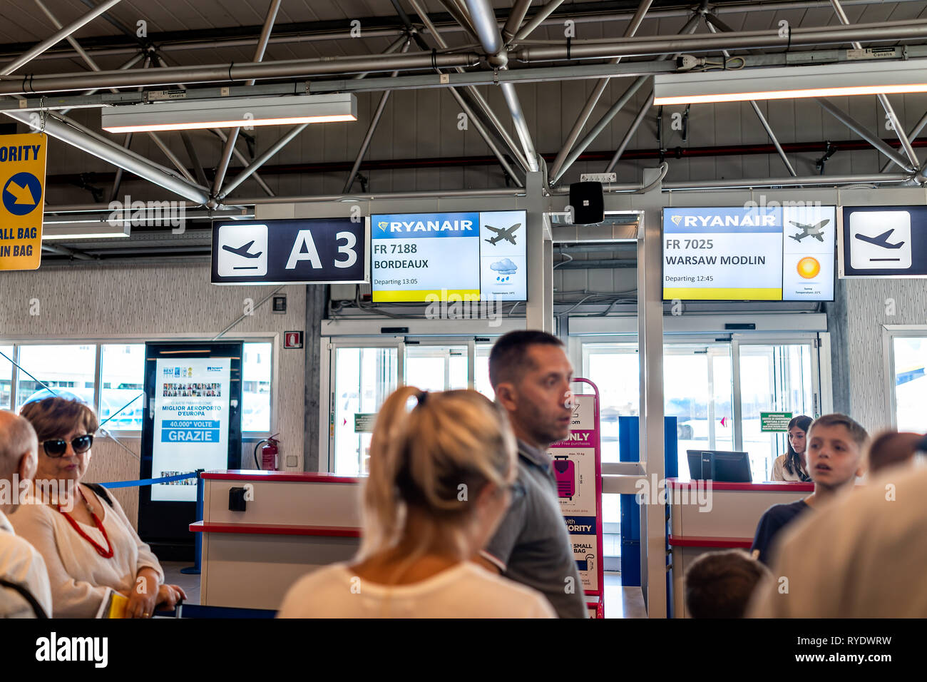 Ciampino, Italy - September 6, 2018: Many people passengers waiting to board late Ryanair airplane domestic European Union flight low-cost cheap airli Stock Photo