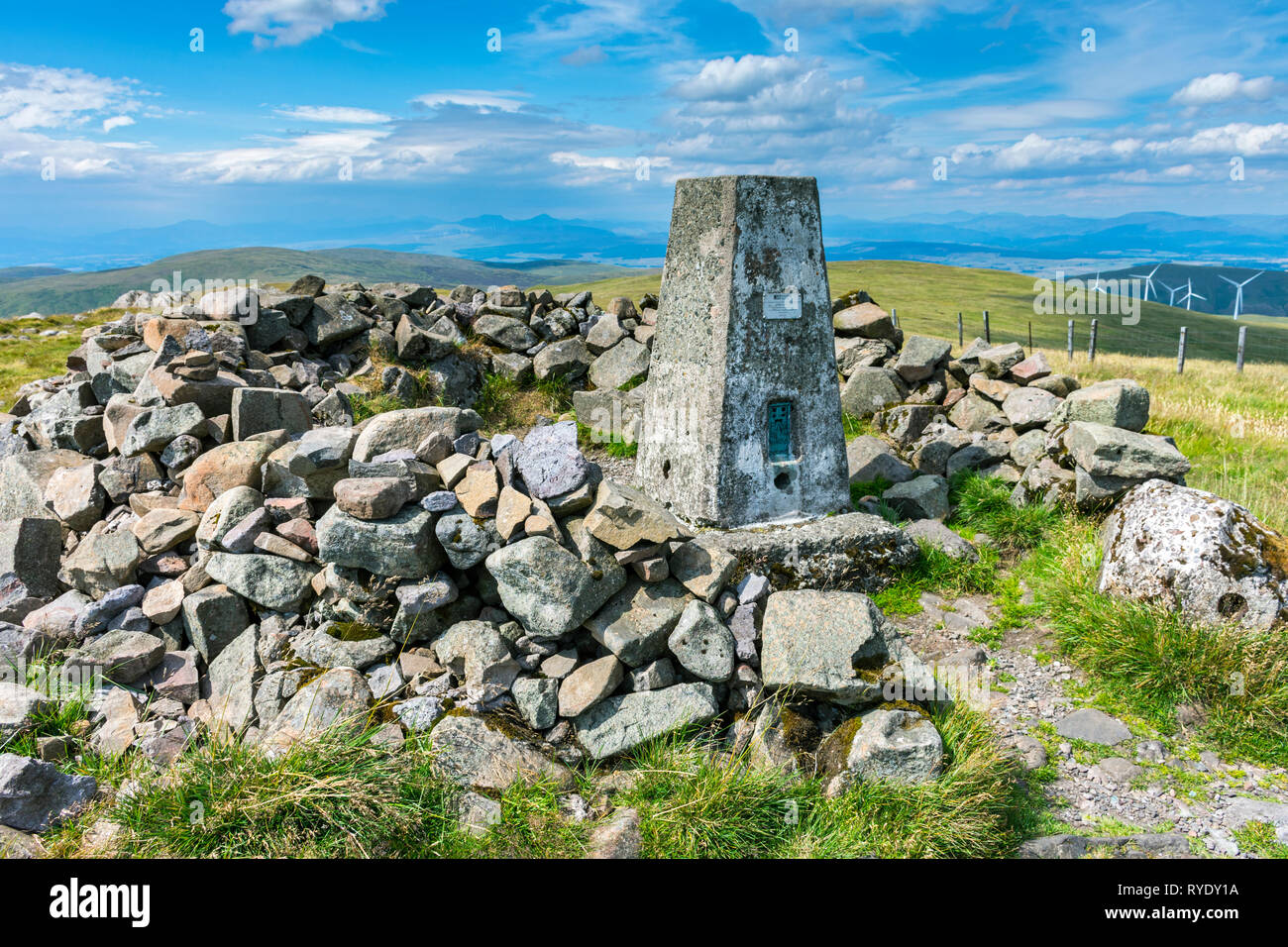 The trig point at the summit of Ben Cleuch in the Ochil Hills, Clackmannanshire, Scotland, UK Stock Photo