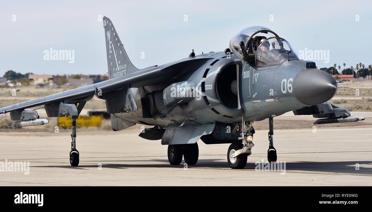 A Marine Corps AV8B Harrier Jump Jet belonging to VMA214 on the runway at MCAS Yuma Stock A Marine Corps AV8B Harrier Jump Jet belonging to VMA214 on the runway at MCAS Yuma Stock