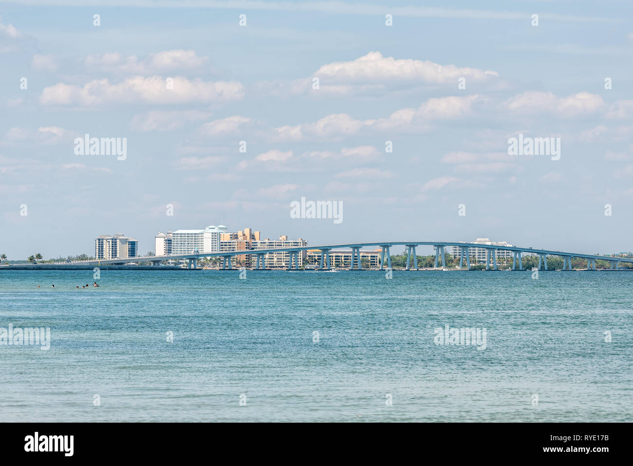 Sanibel Island, USA Bay during sunny day with toll bridge causeway bridge highway road and cars in traffic holiday vacation destination in Florida peo Stock Photo