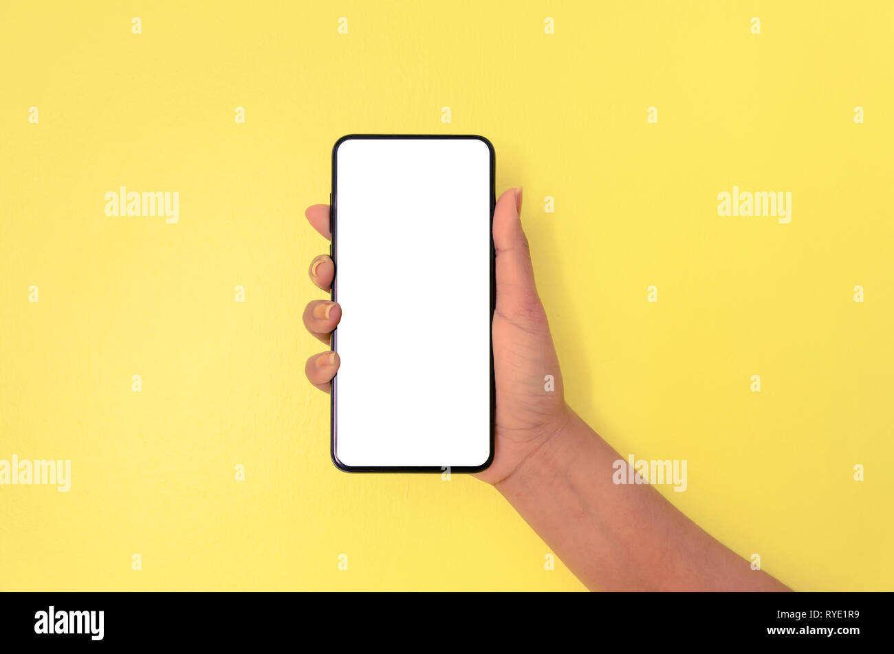 Human hand holding smartphone with white screen background, Mobile ...