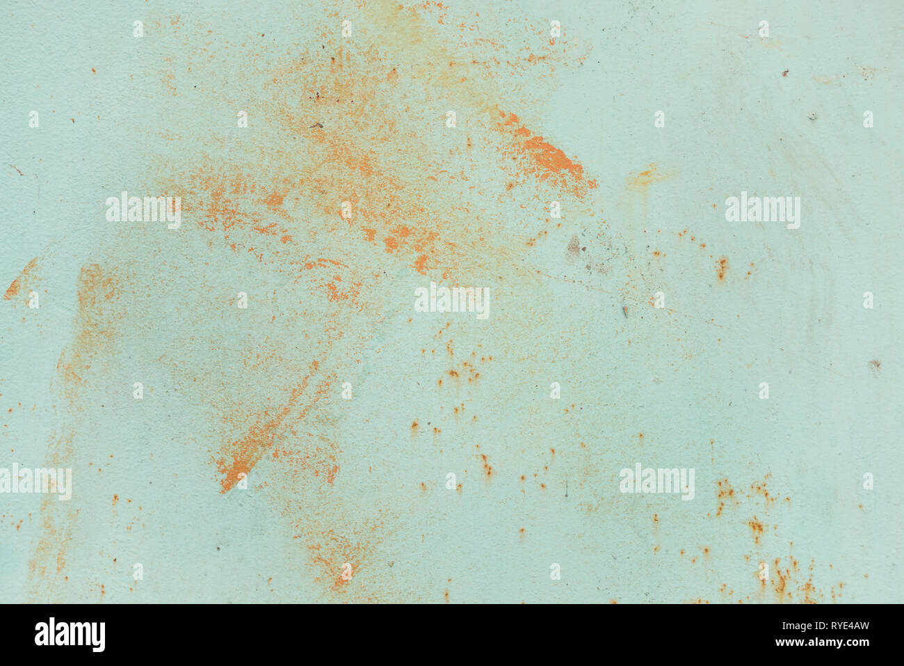 Multicolored abstract background: old rusty metal surface with blue paint flaking and cracking texture Stock Photo