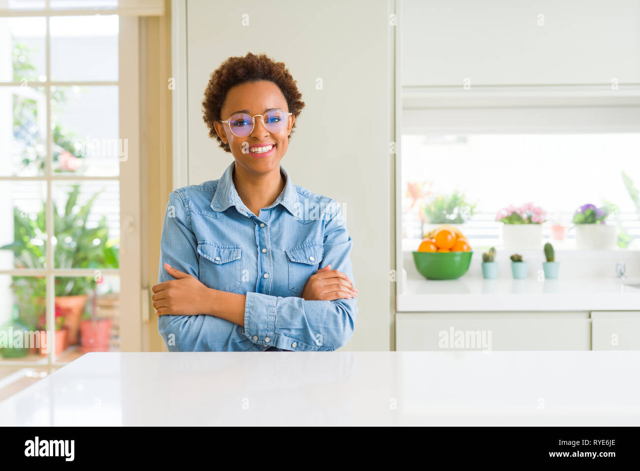 Young beautiful african american woman wearing glasses happy face ...