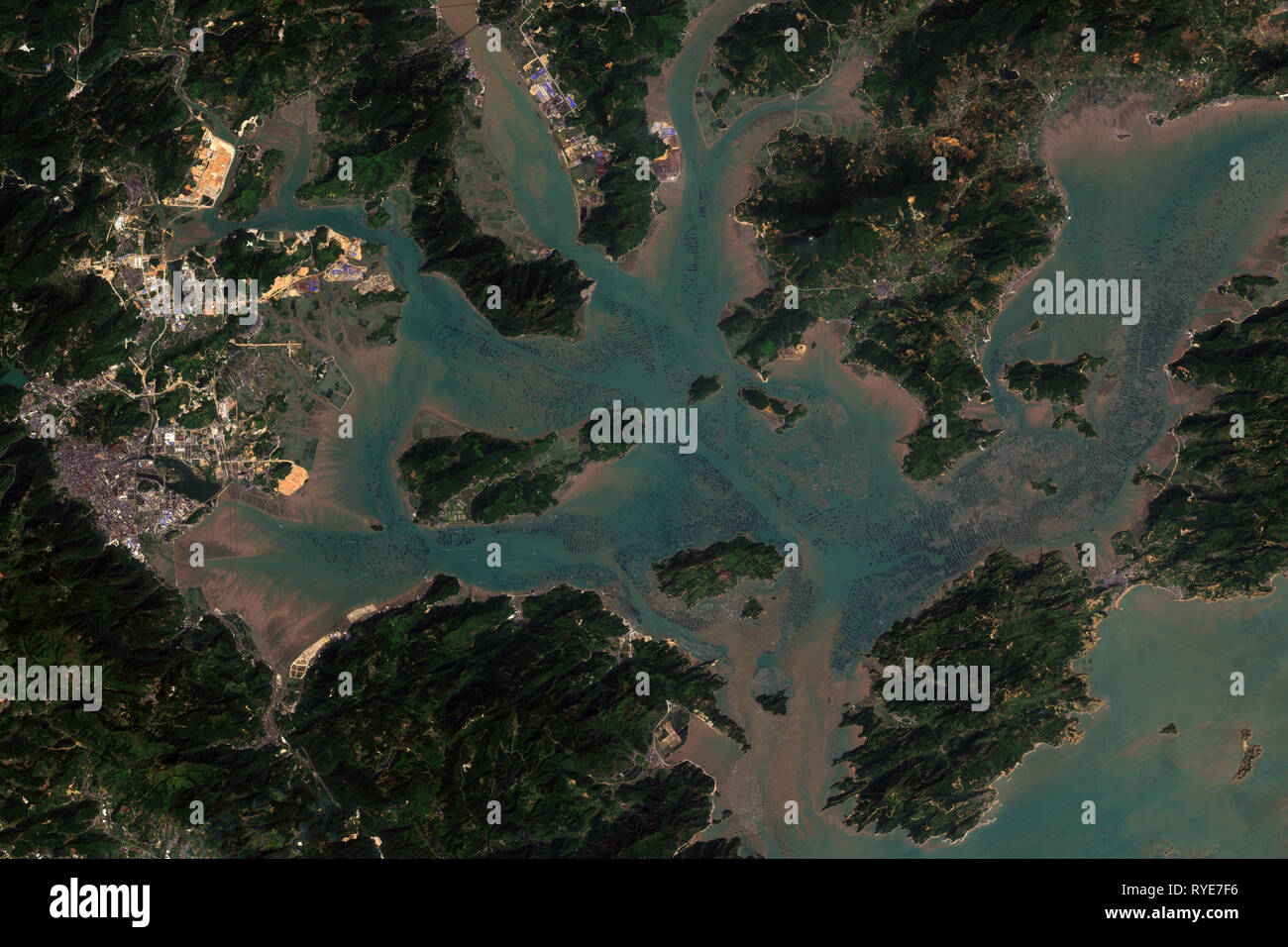 High resolution satellite image of aquaculture farms in Sansha Bay, Fujian, China - contains modified Copernicus Sentinel data [2019] Stock Photo