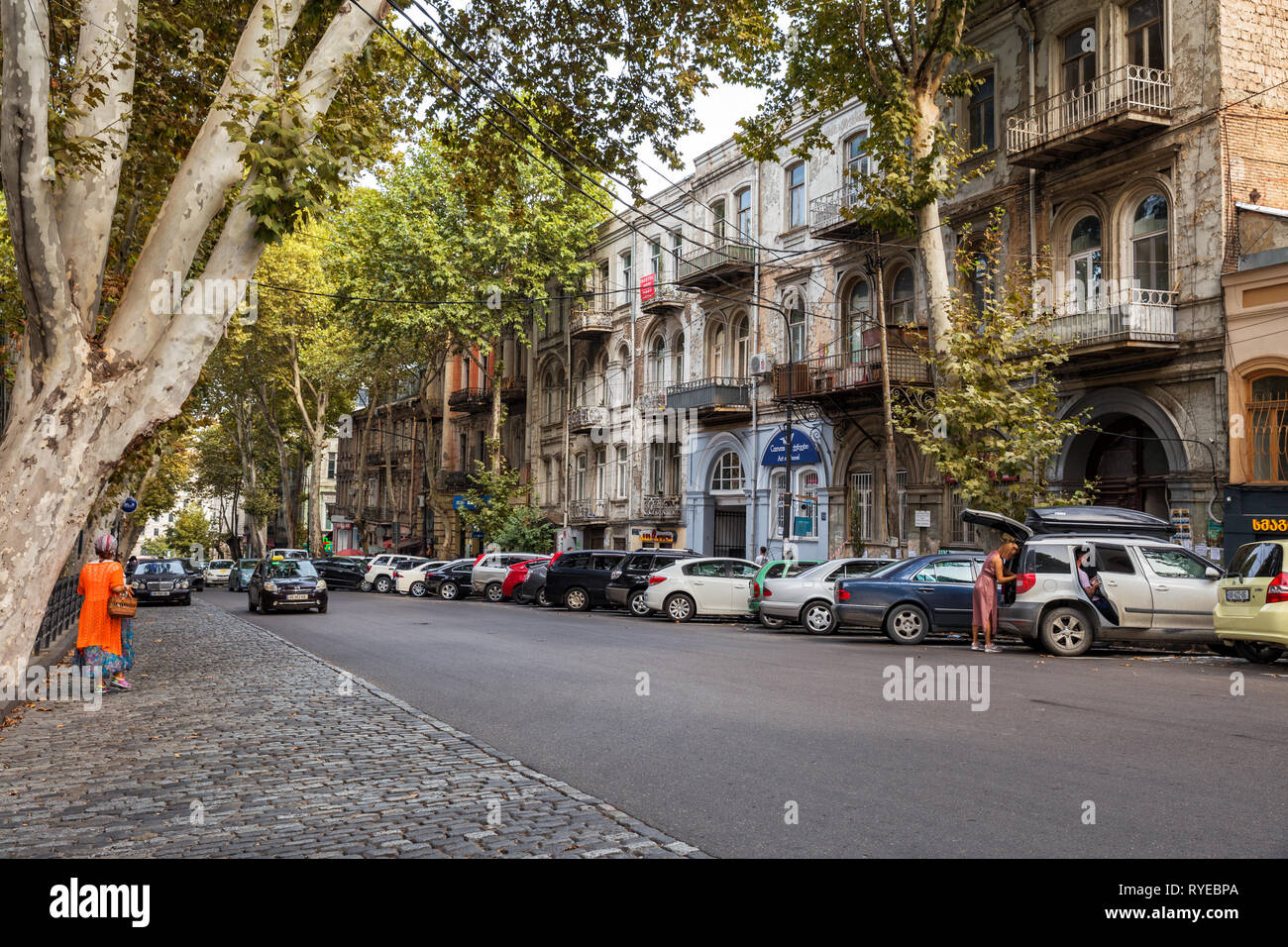 TBILISI, SEPTEMBER 22, 2018 Old town Tbilisi, oneway street, cars parked along the