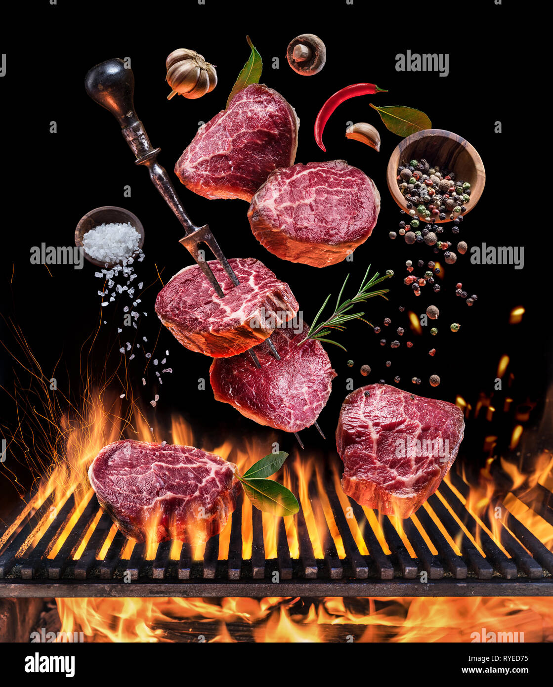 Steak ribeye cooking. Conceptual picture. Steak with spices and cutlery