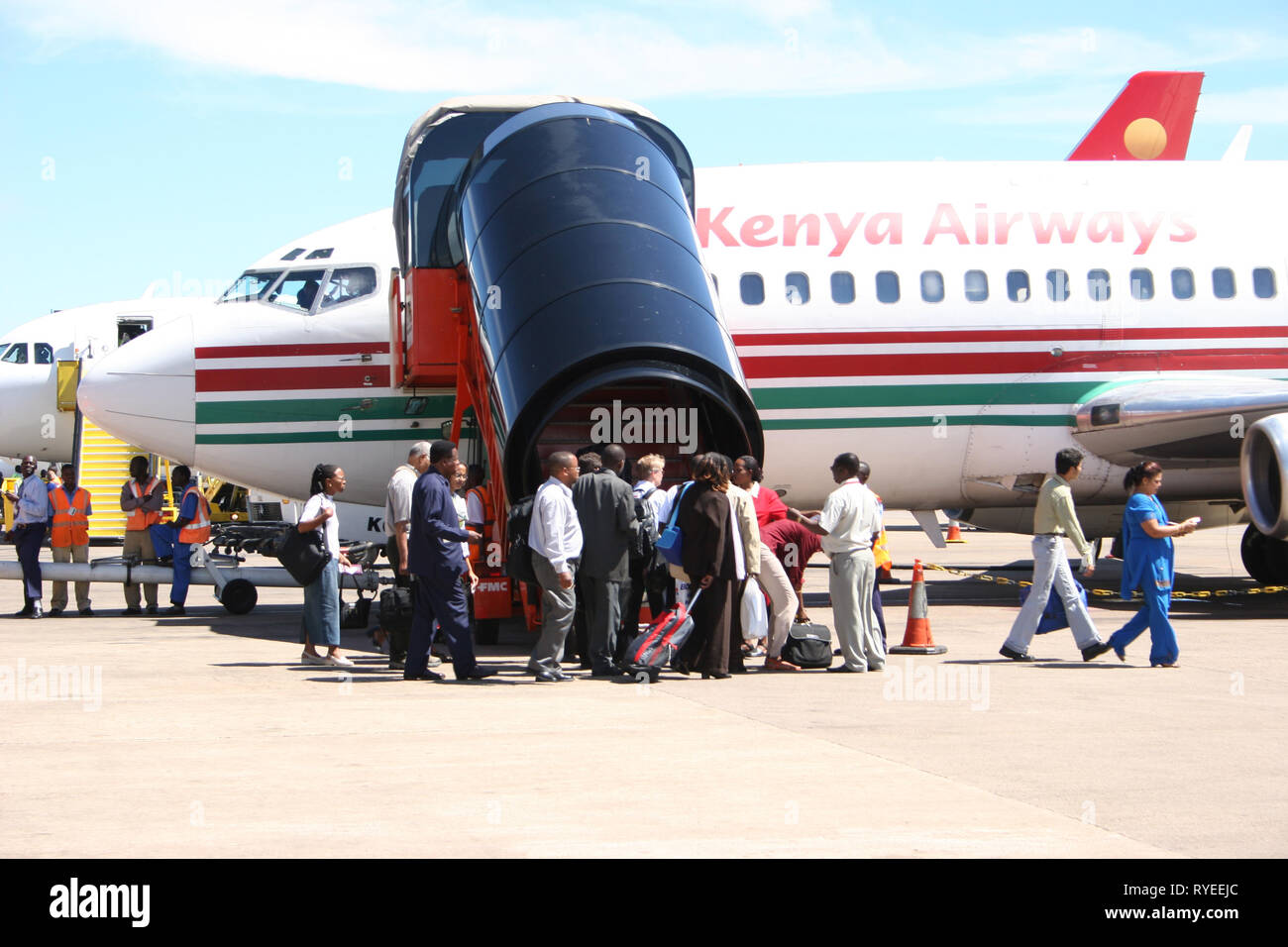 Passengers boarding a Kenya Airways aircraft at Entebbe International Airport, Uganda. Stock Photo