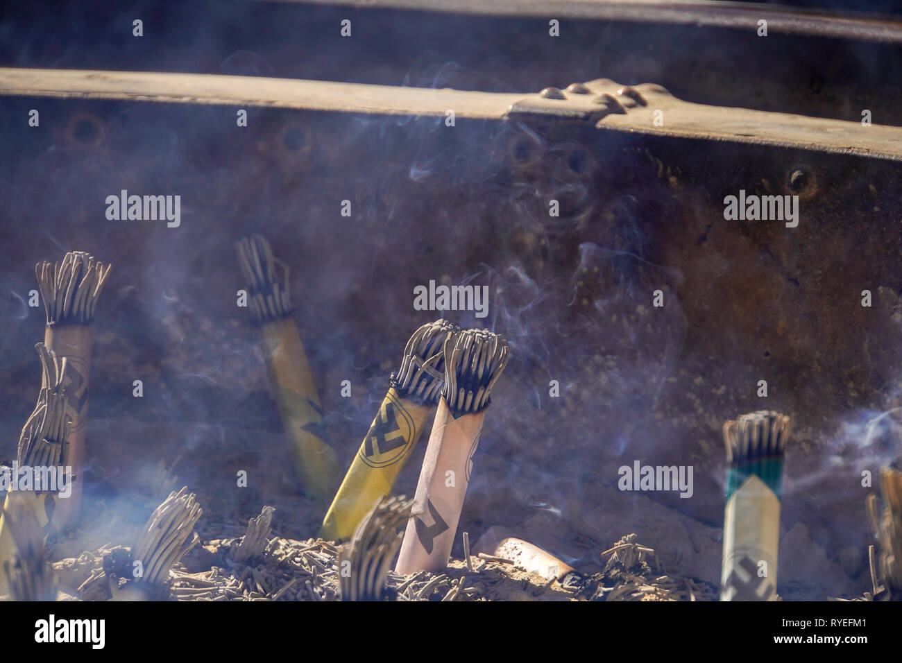 Japan, Tokyo, Asakusa, Senso-ji temple burning incense sticks Stock Photo