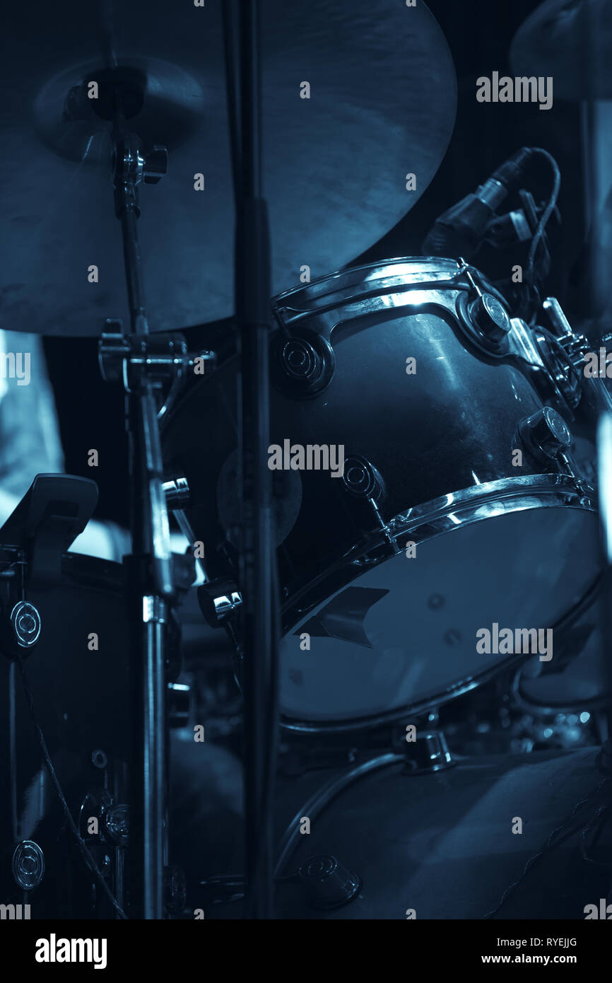 Live music vertical photo with drum set. Blue tonal filter effect Stock Photo