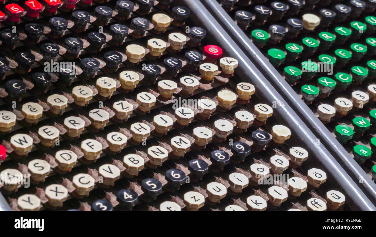 The old keyboard of the typewriter with the keys and letters on it Stock Photo