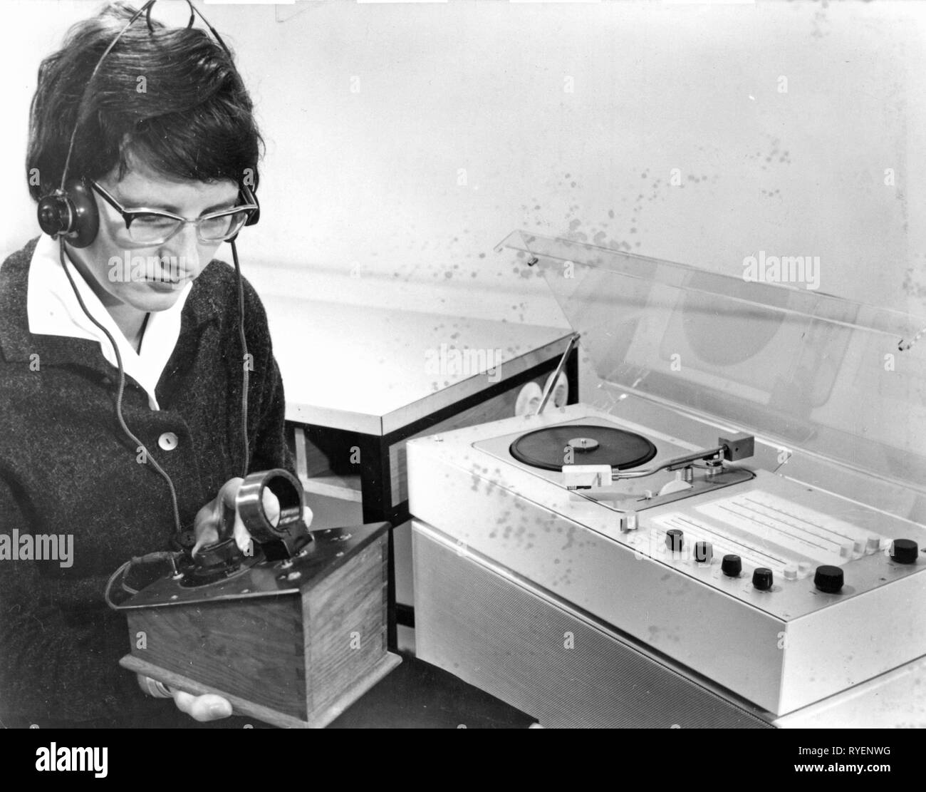 broadcast, radio, radio sets, Braun Phonosuper SK 61 transistor radio, combinated with record player PV3, aside a young woman with a tubeless Trumpf cylinder decector from 1923, Germany, August 1962, Additional-Rights-Clearance-Info-Not-Available Stock Photo