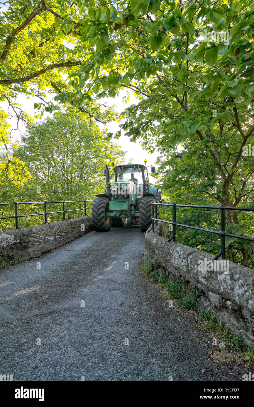 Tractor crossing the River Nidd at Wath village Nidderdale North Yorkshire Stock Photo