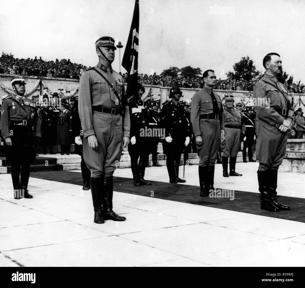 National Socialism, Nuremberg Rally, 'Reichsparteitag Grossdeutschlands', Nuremberg 5.9.1938-12.9.1938, Corps Leader of the NSKK Adolf Huehnlein, Chief of General staff of SA Viktor Lutze, behind him Second in Command Rudolf Hess, Hermann Göring in storm battalion uniform, Fuehrer and Chancellor of the Reich Adolf Hitler, during appeal on the Nazi party rally grounds, Additional-Rights-Clearance-Info-Not-Available Stock Photo