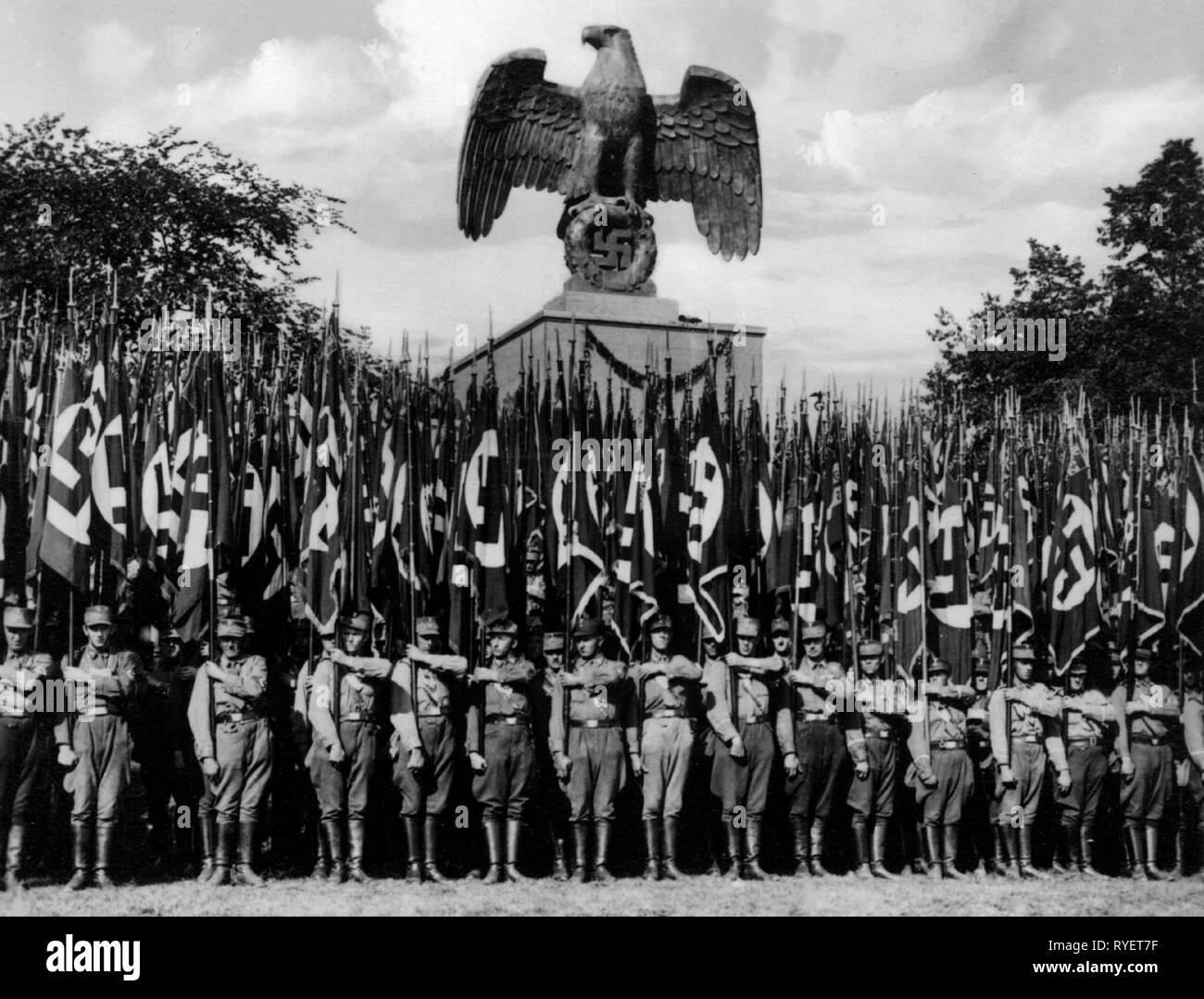 Nazism / National Socialism, 'Reichsparteitag der Freiheit', Nuremberg 10.9.1935 - 16.9.1935, parade the storm battalion (SA), big banner unit in front of imperial eagle, 'Tag der Sturmabteilungen', Additional-Rights-Clearance-Info-Not-Available Stock Photo