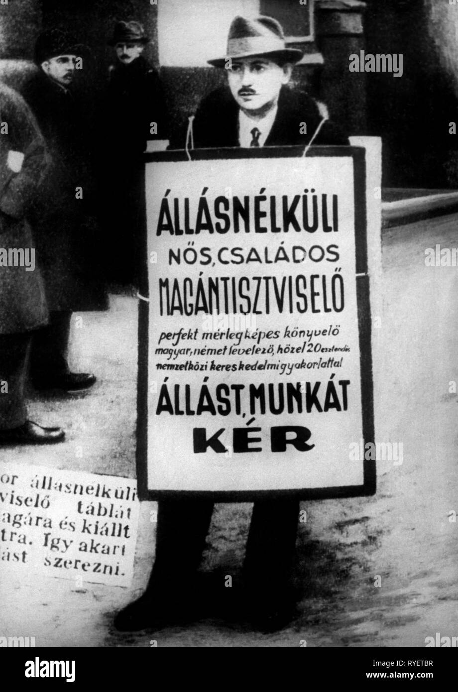 geography / travel, Hungary, politics, economic crisis, unemployed man on the street asking for work with big poster, 1933, Additional-Rights-Clearance-Info-Not-Available Stock Photo