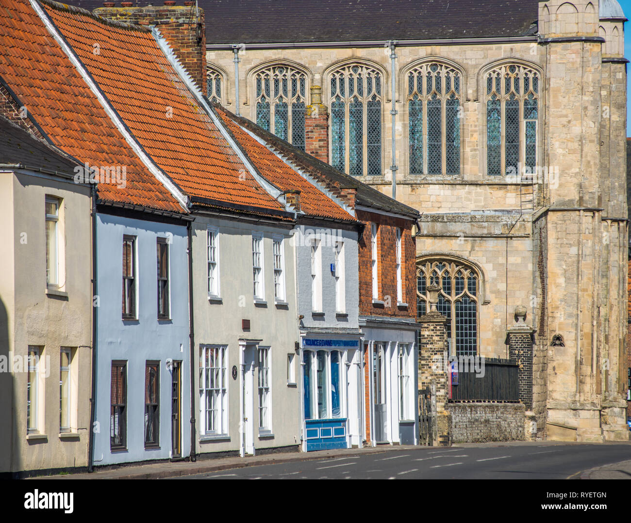 Cottages on church st., with St Margarets church aka Kings Lynn Minster